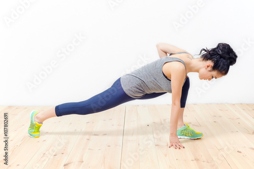girl engaged in fitness at home