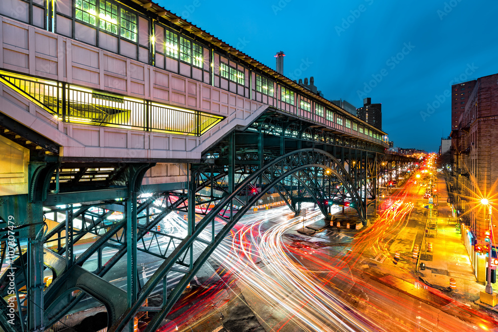 Suspended 125th Street Metro-North Railroad commuter rail hub station, in  Harlem, New York City. Rush hour traffic leaves light trails on Broadway.  Stock Photo | Adobe Stock