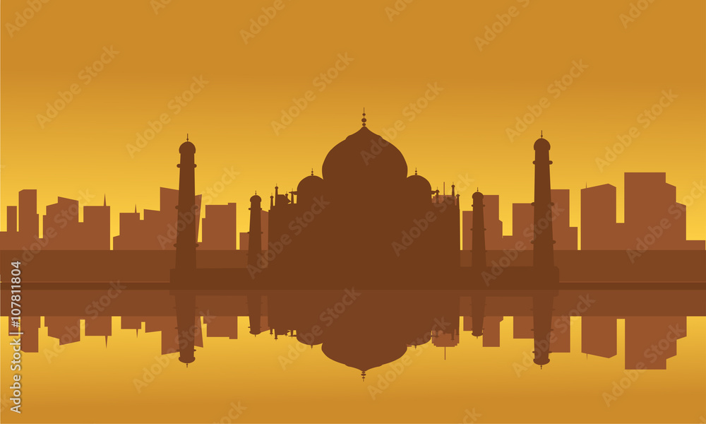 Silhouette of Taj Mahal and city