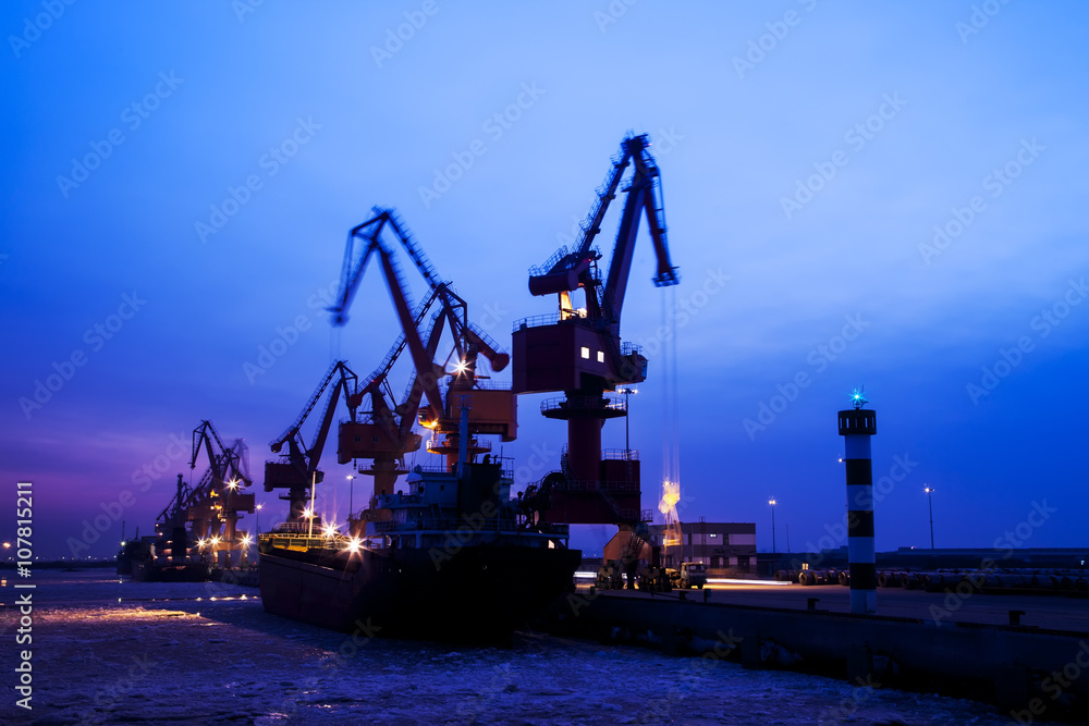 In the evening, portal crane in freight terminal