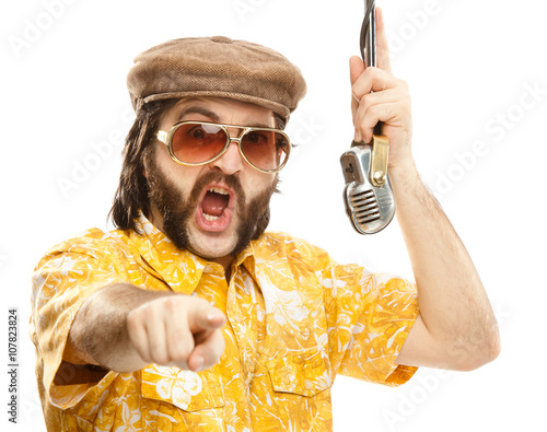 1970s vintage show man sing with hawaiian shirt and microphone isolated on white