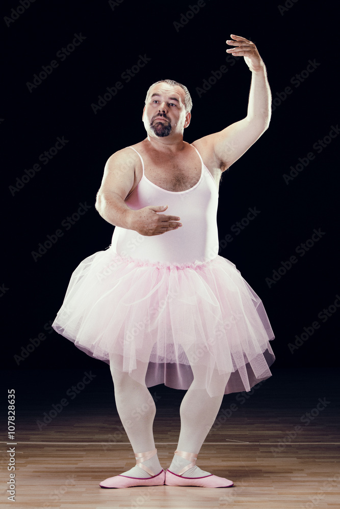 Naklejka premium funny fat classical dancer on black background