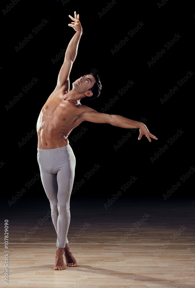 Obraz premium handsome classical dancer on black background
