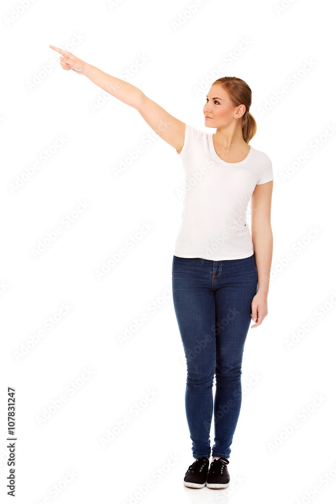 Student woman showing copyspace or something Student woman showing copyspace or something
