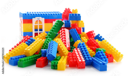 Colorful plastic children toys isolated on white background