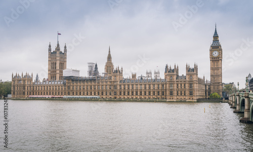 River Thames and Palace of Westminster  known as Houses of Parliament . Palace of Westminster located on bank of River Thames in City of Westminster  London. UK.