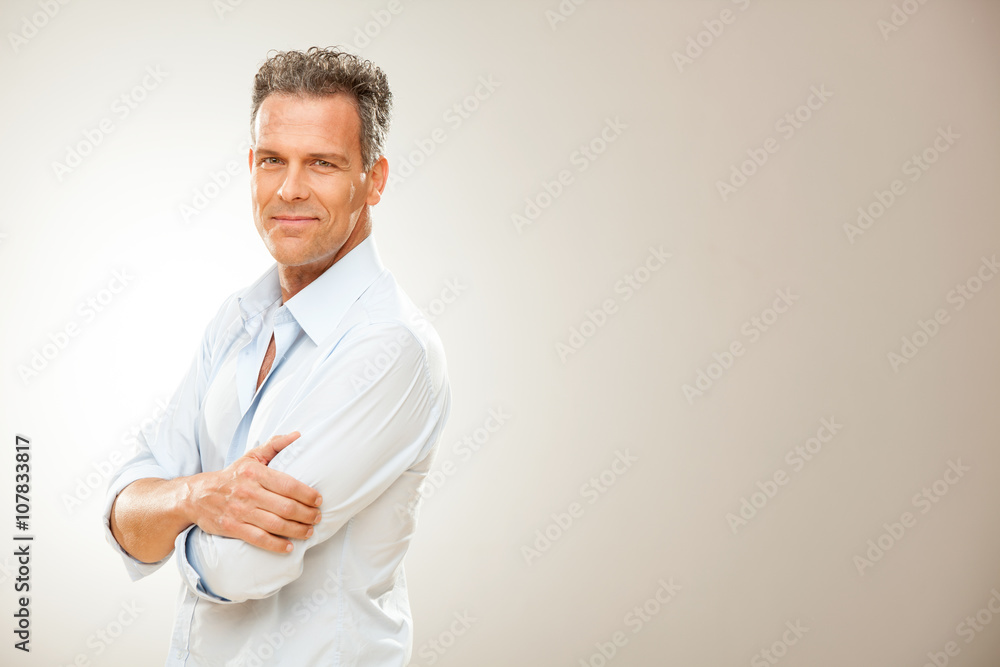 handsome man with shirt portrait isolated on grey handsome man with shirt portrait isolated on grey