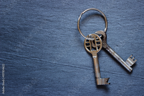 Bunch of keys on dark background © robsphoto