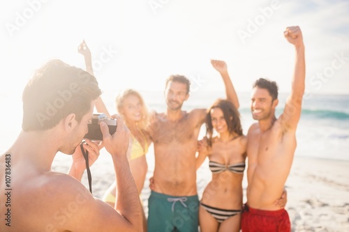 Man taking picture of his friends