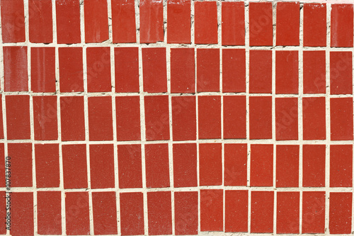Old red tiles wall © olamiabo