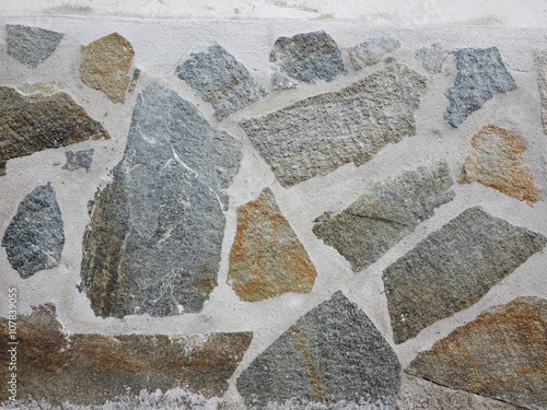 Irregular opus incertum stone wall finish useful as a background