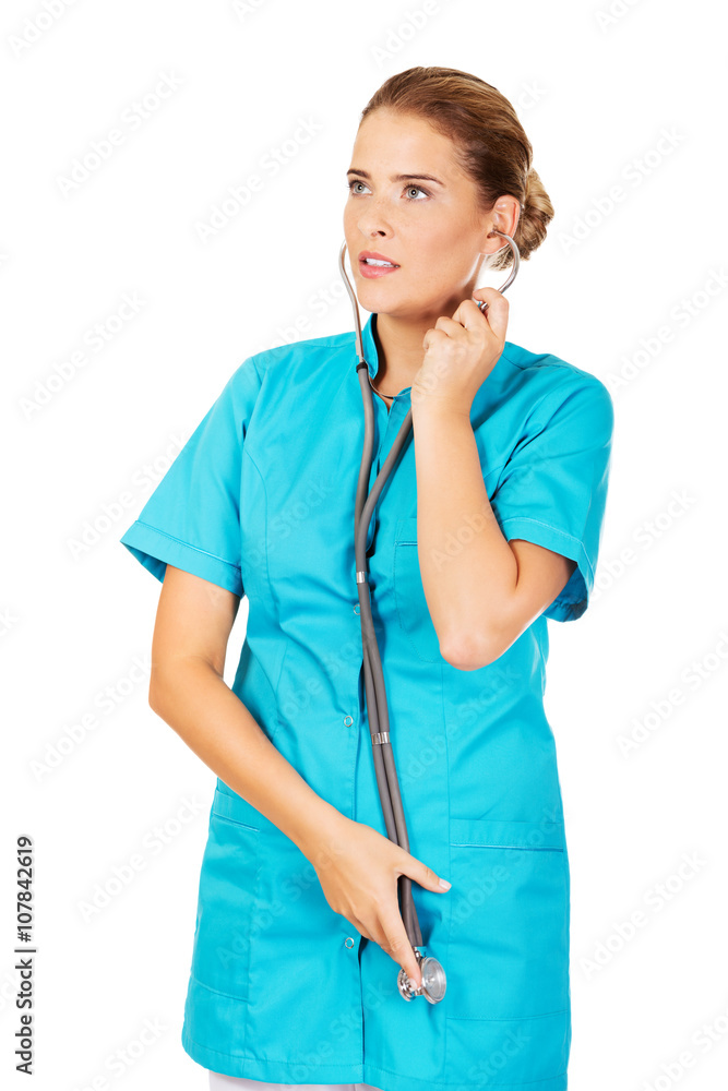 Young female doctor or nurse with stethocope Young female doctor or nurse with stethocope