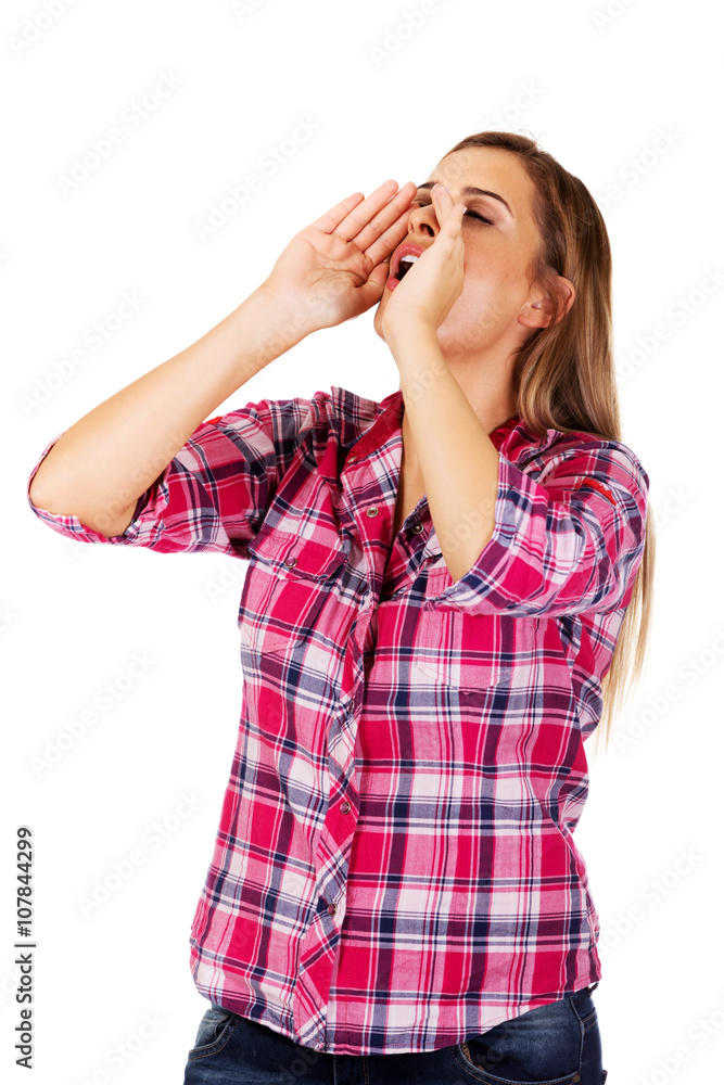 Woman yelling using her hands as megaphone
