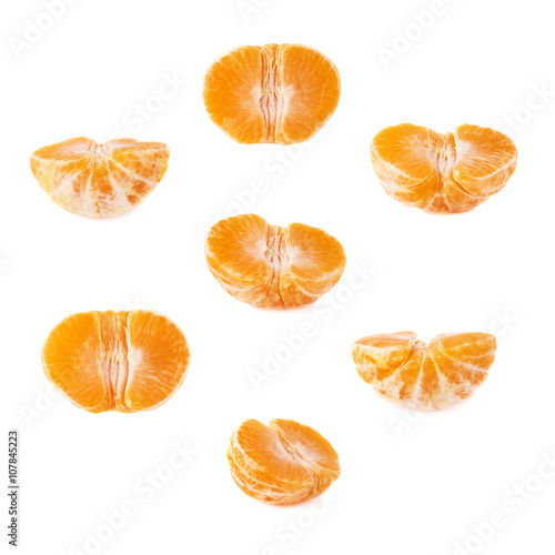 Half of fresh juicy tangerine fruit isolated over the white background