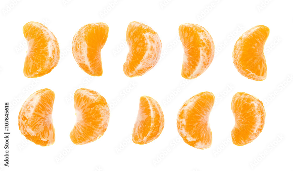 Slice sections of tangerine isolated over the white background Slice sections of tangerine isolated over the white background
