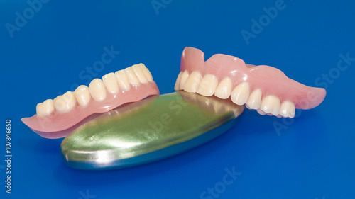 Denture on a blue background