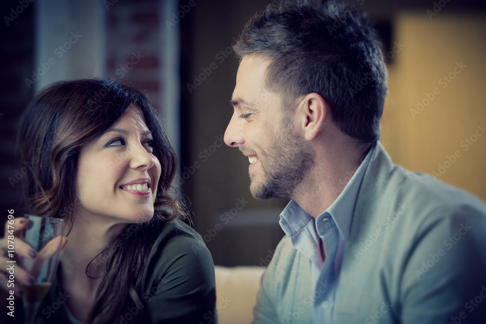 young casual couple flirt in the living room young casual couple flirt in the living room