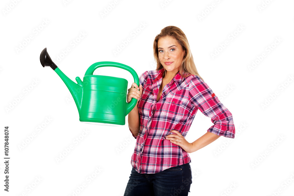 Happy woman holding a watering can Happy woman holding a watering can