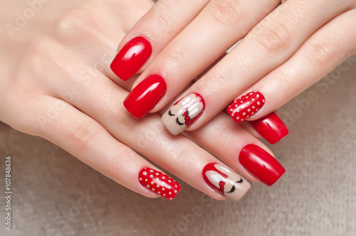red manicure with rabbits
