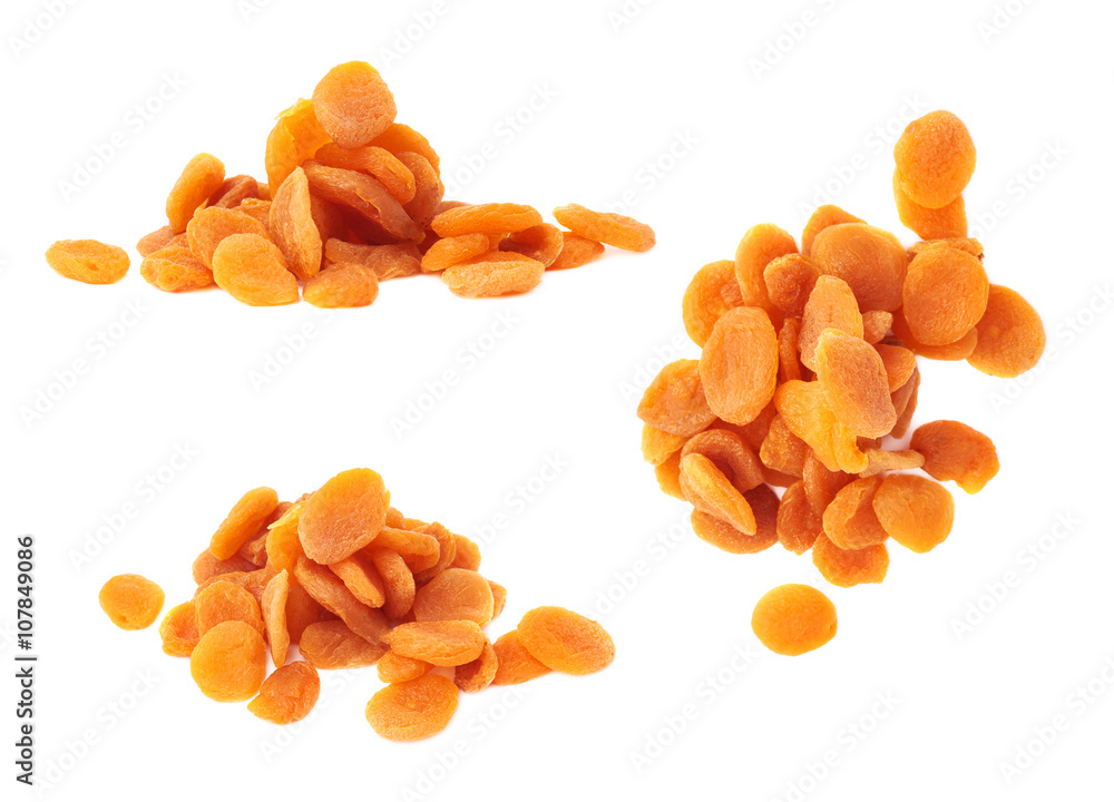 Dried orange apricots over white background Dried orange apricots over white background
