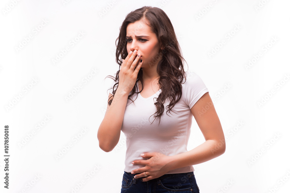 Closeup portrait of young unhappy, annoyed, sick woman about to chuck, throw up, retch barf, hurl isolated on white background.