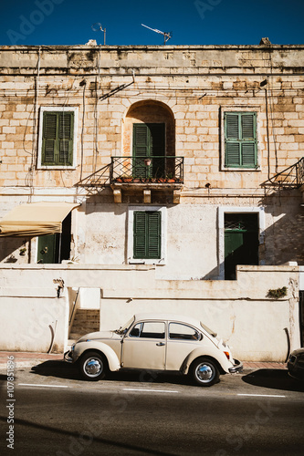 Old Vintage Car Parked in  Malta Streets photo