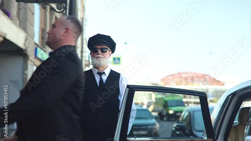 Bearded Driver Near Luxury Car