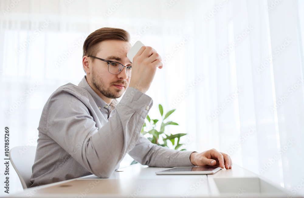 businessman with smarphone at home office businessman with smarphone at home office