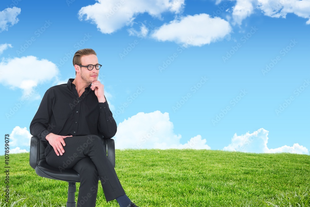 Composite image of thoughtful businessman sitting Composite image of thoughtful businessman sitting