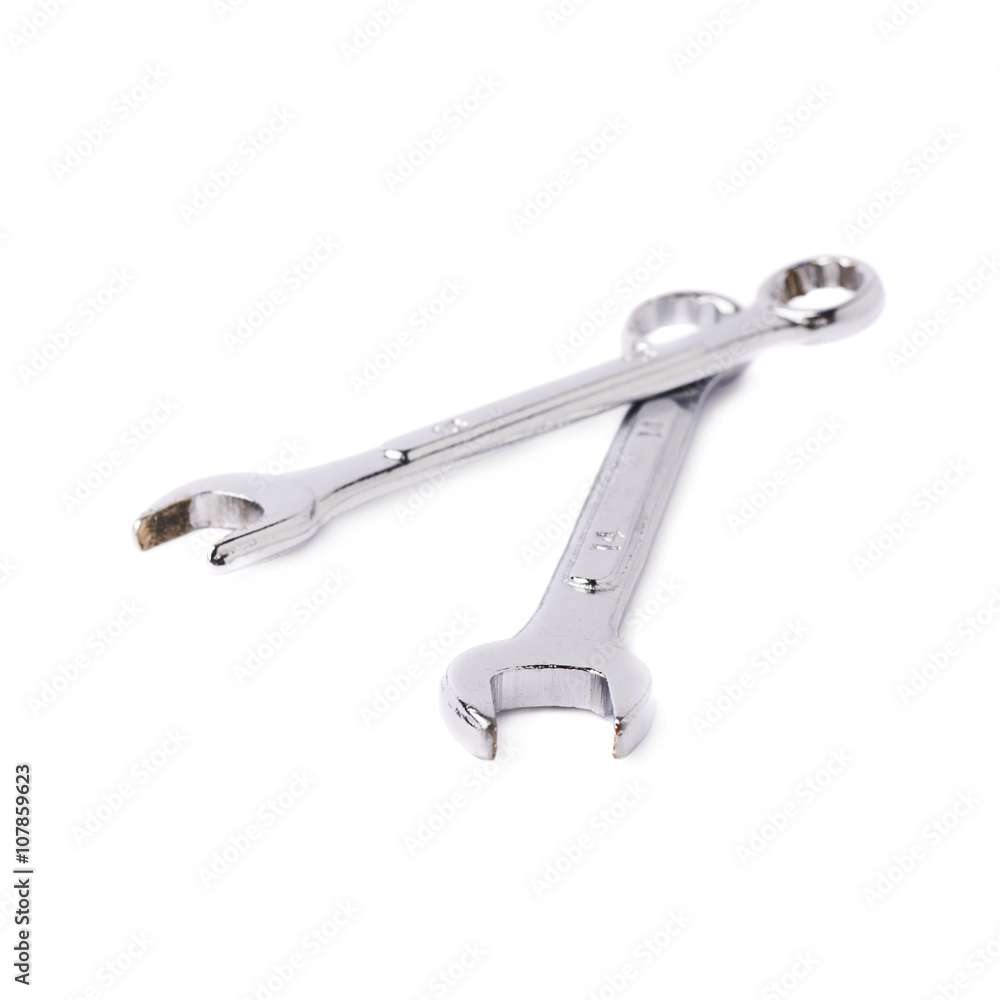 Couple of wrenchs metal instruments isolated over white background Couple of wrenchs metal instruments isolated over white background