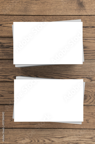 white blank name card front and back on wooden background