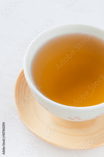 A Cup of Chinese hot tea on white table
