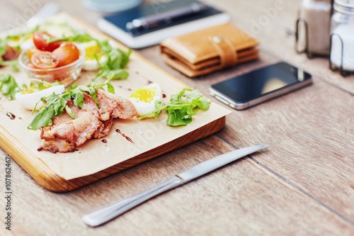 Platter of meats and salad on a table for lunch