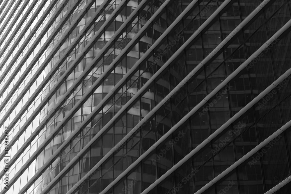 Skyscrapers with glass facade. Modern buildings in Paris. Concepts of economics, financial, business future. Copy space for text. Black and white Skyscrapers with glass facade. Modern buildings in Paris. Concepts of economics, financial, business future. Copy space for text. Black and white