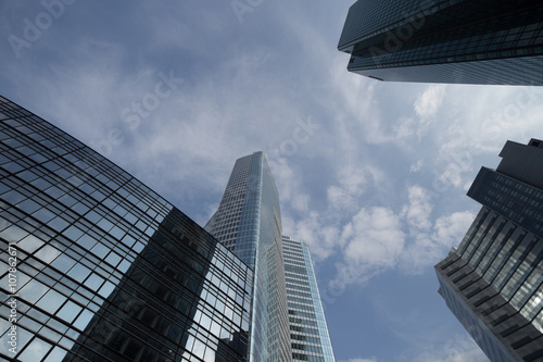 Skyscrapers with glass facade. Modern buildings in Paris. Concepts of economics  financial  business  future. Copy space for text.