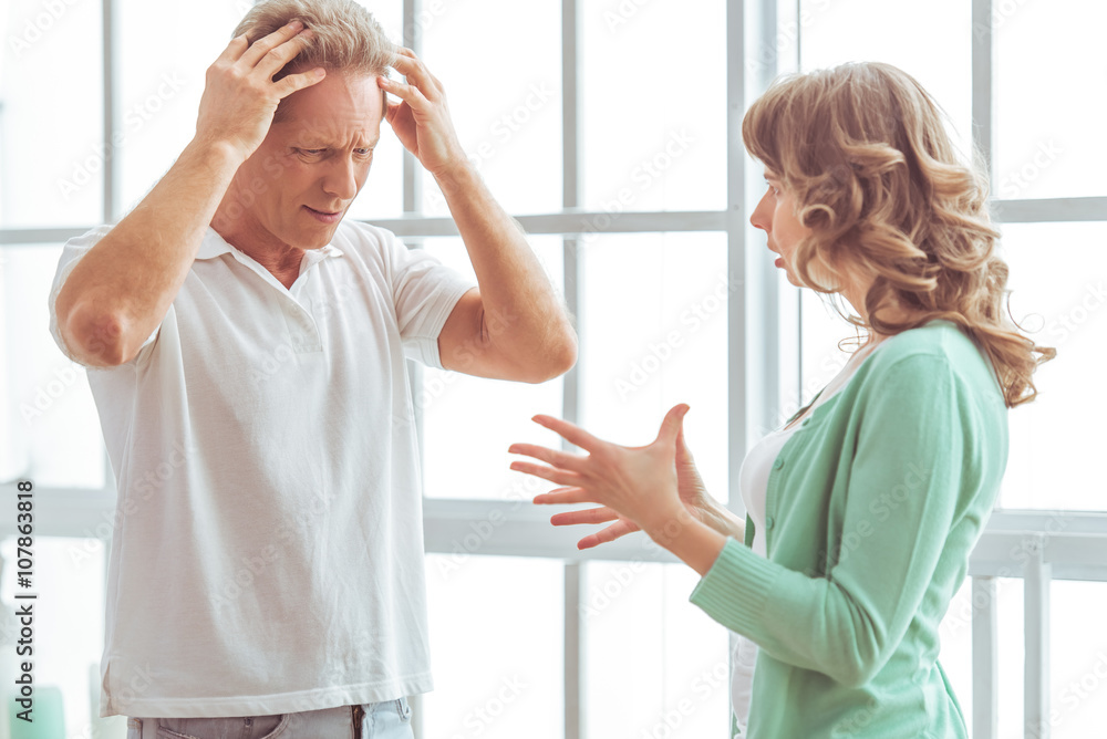 Unhappy couple quarreling Unhappy couple quarreling