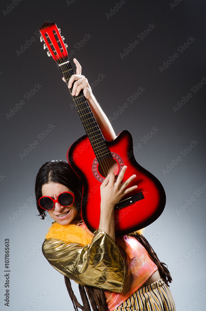Man with guitar in musical concept