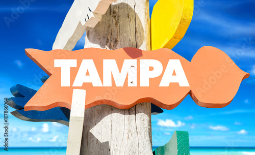 Tampa signpost with beach background
