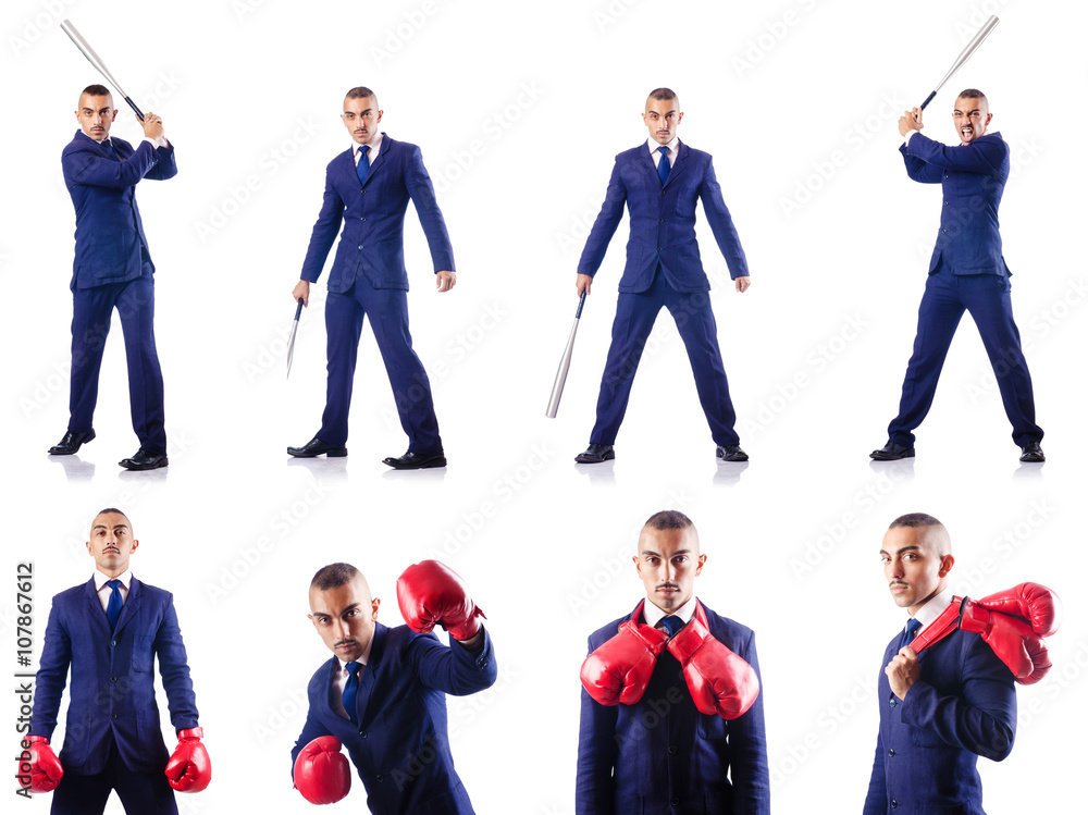 Obraz premium Handsome businessman with bat on white