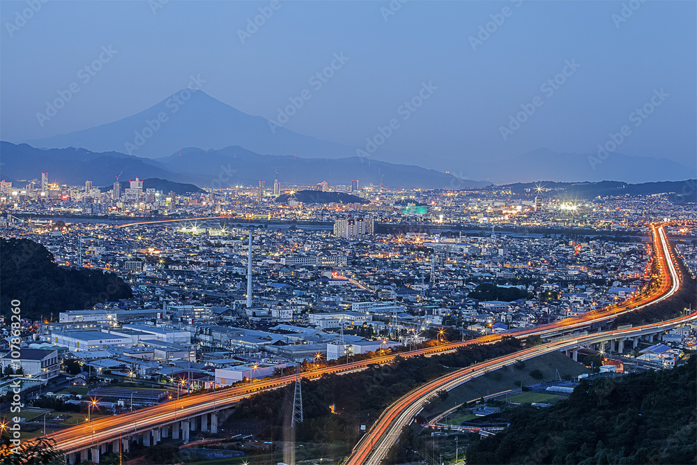 Shizoka city view with expressway and Mount Fuji at night time