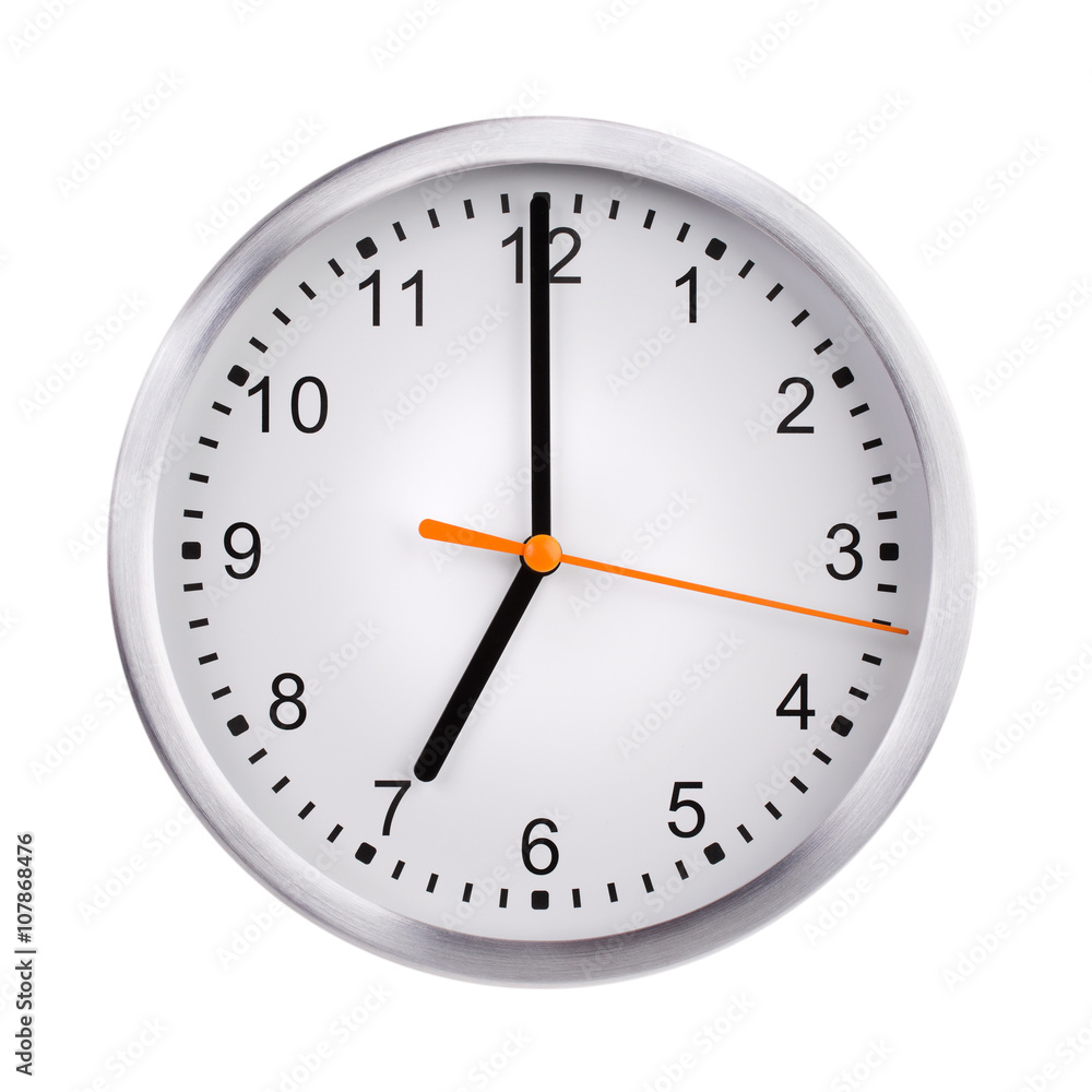Сlock shows exactly seven o'clock Сlock shows exactly seven o'clock
