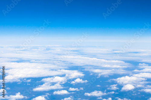 above view clouds and earth horizon from aircraft