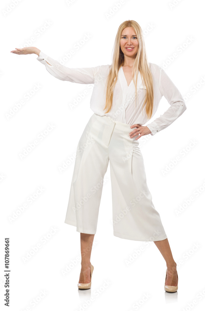 Blond hair model in elegant flared pants isolated on white Blond hair model in elegant flared pants isolated on white