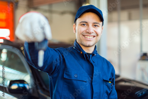 Mechanic giving you the car keys photo