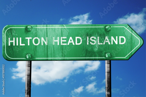 hilton head island road sign , worn and damaged look