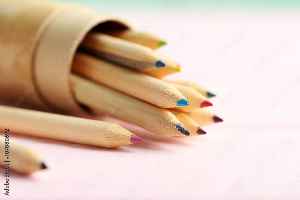 Obraz premium Drawing colourful pencils on a wooden background