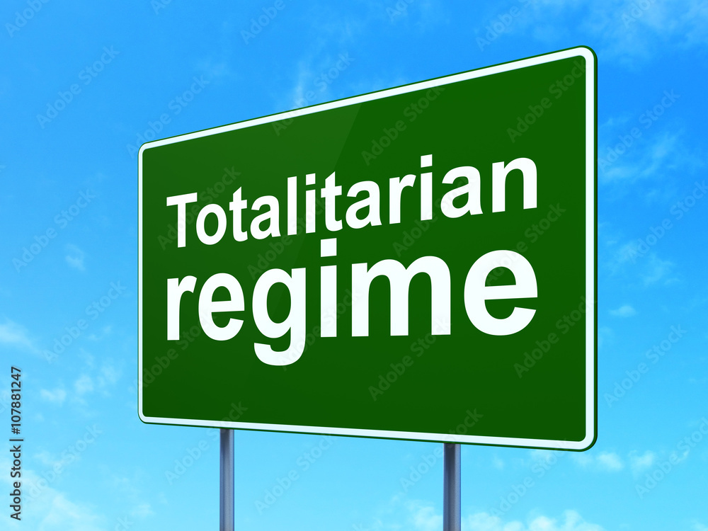 Politics concept: Totalitarian Regime on road sign background Politics concept: Totalitarian Regime on road sign background