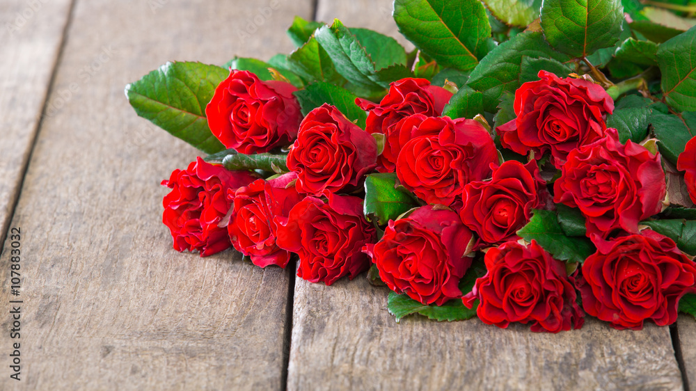 red roses on wooden board, Valentines Day background red roses on wooden board, Valentines Day background
