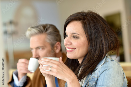Mature couple relaxing in coffee shop