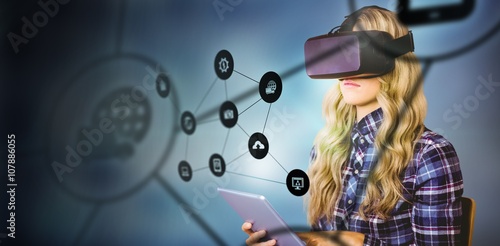 Konstfotografi Composite image of pretty casual worker using oculus rift